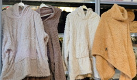 Hoodies en poncho's